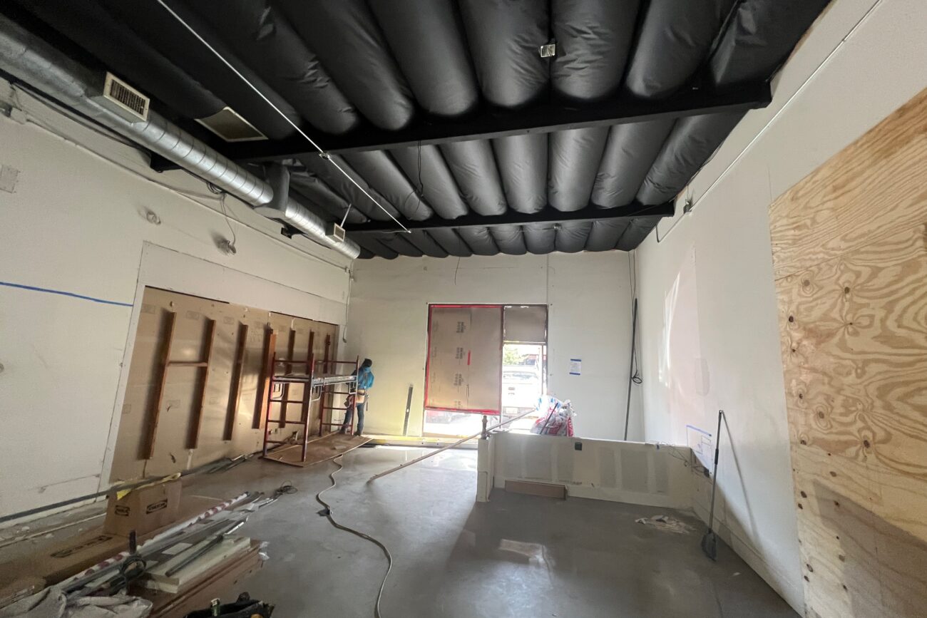 New lobby/waiting area, under construction. Drywall and prepping to cut the walls open for glass.