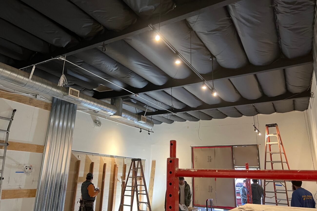 Siding and lighting going up.