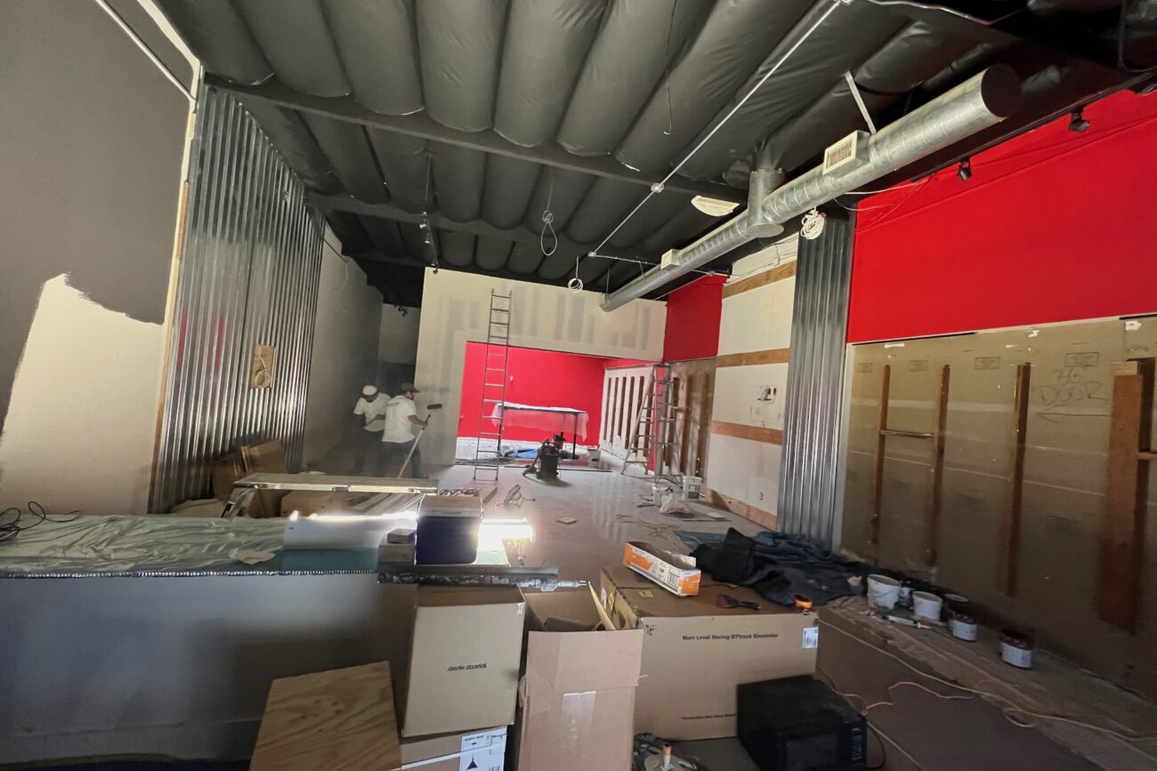 Some color going down. Front desk being built out.