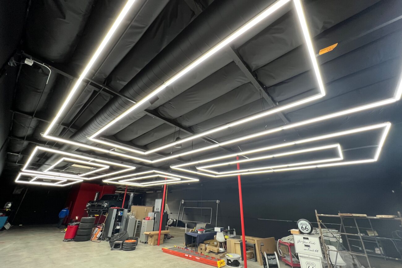 Some of the lights are hung and we can start to use the shop again.