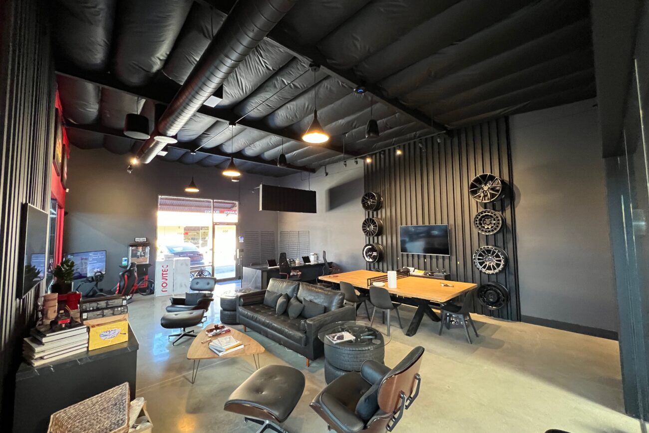 Lobby almost done. Still need to finish the wheel wall, hang the merchandise grids and get the balance of the furniture delivered.